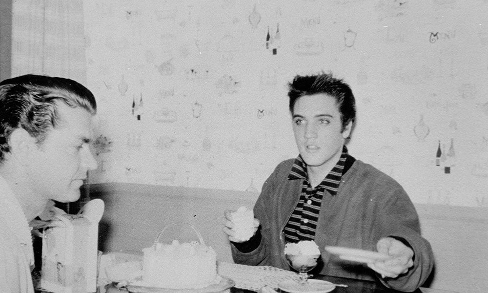 Elvis Presley and Sam Phillips photo by Colin Escott and Michael Ochs Archives and Getty Images