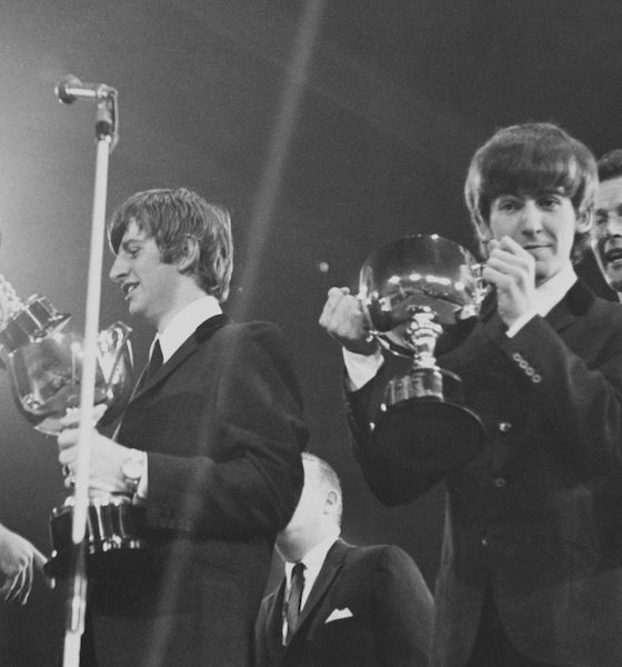 The Beatles with Roger Moore at the 1963 NME Poll Winners Concert. Photo: Mark and Colleen Hayward/Redferns