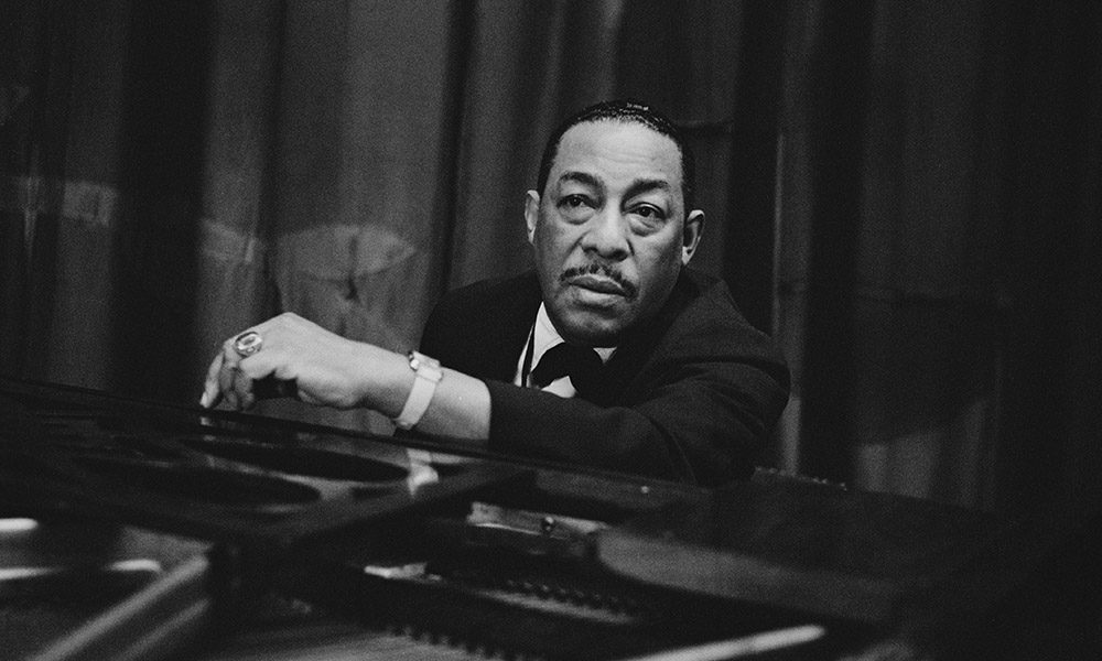 Johnny Hodges at a piano