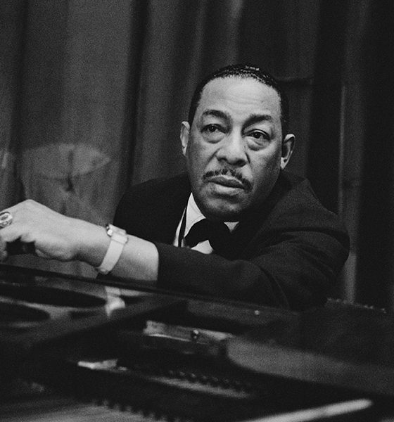 Johnny Hodges at a piano
