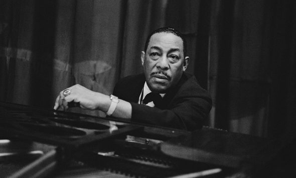 Johnny Hodges at a piano