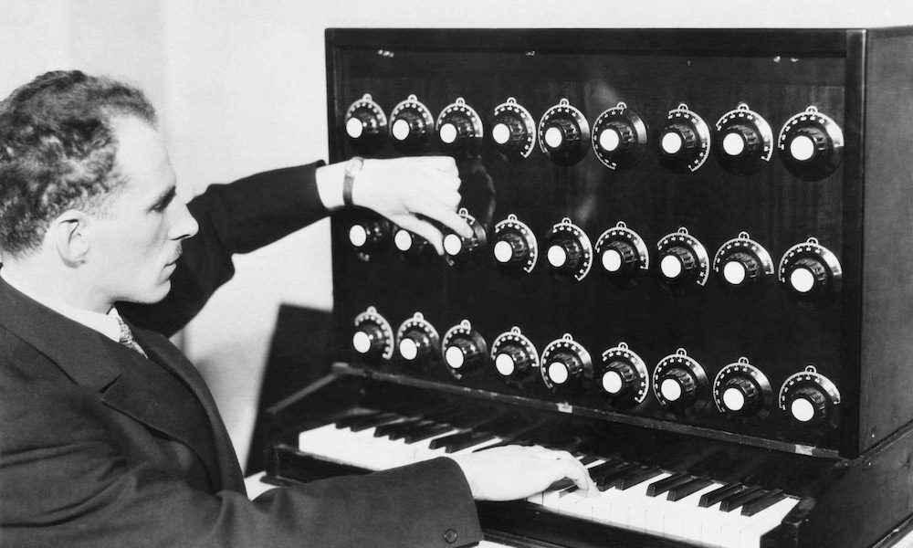 Prof. Theremin with his strange and weird instrument, device, the ether-wave-harmonium