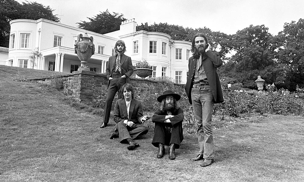 https://www.udiscovermusic.com/wp-content/uploads/2019/09/The-Beatles-Abbey-Road-press-shot-10-1000.jpg