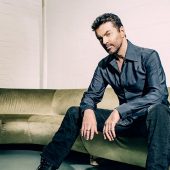 Watch The Lyric Video For George Michael’s New Single, ‘This Is How (We Want You To Get High)’