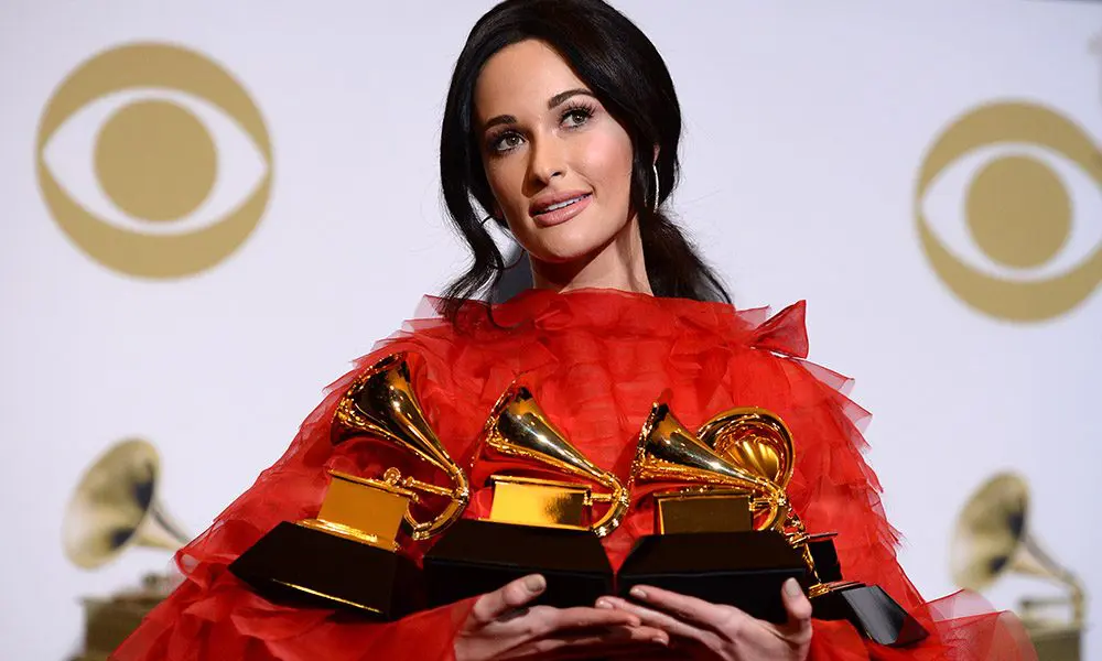 Kacey Musgraves Holding Grammys