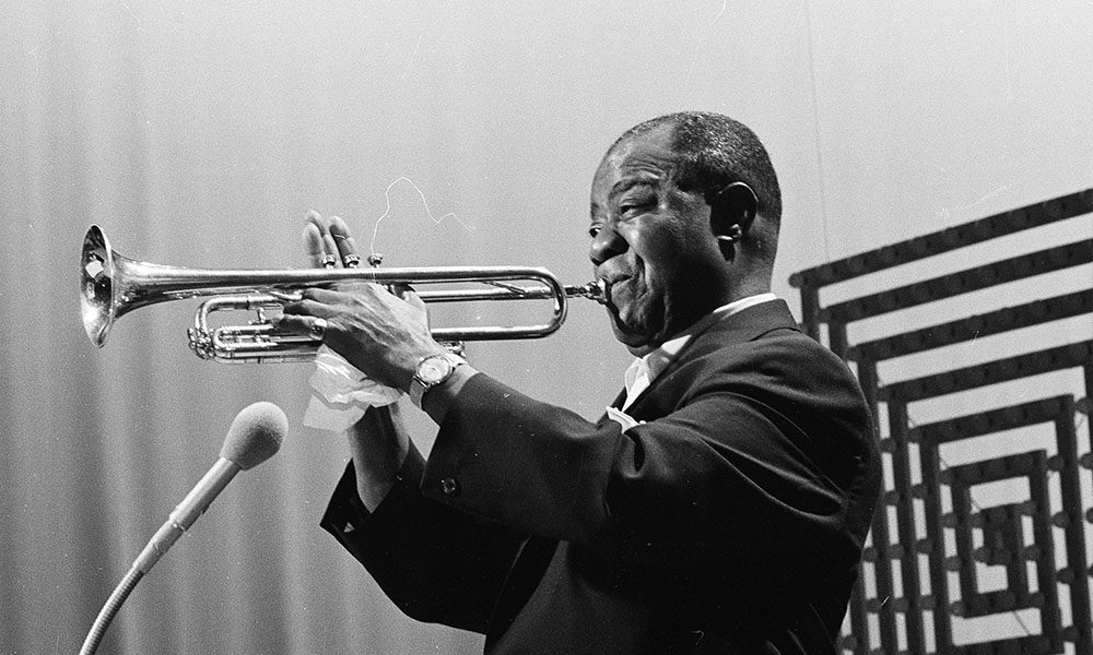Louis Armstrong, artist known for What a Wonderful World, Playing Trumpet