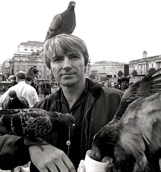 Neil Finn of Crowded House surrounded by birds in Trafalgar Square 1991
