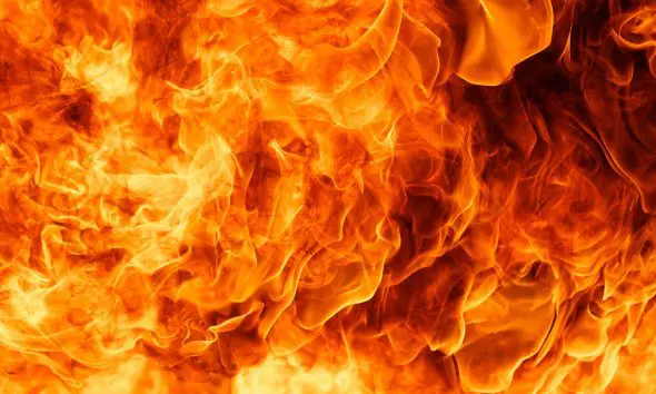 Close-Up Of Fire Against Black Background