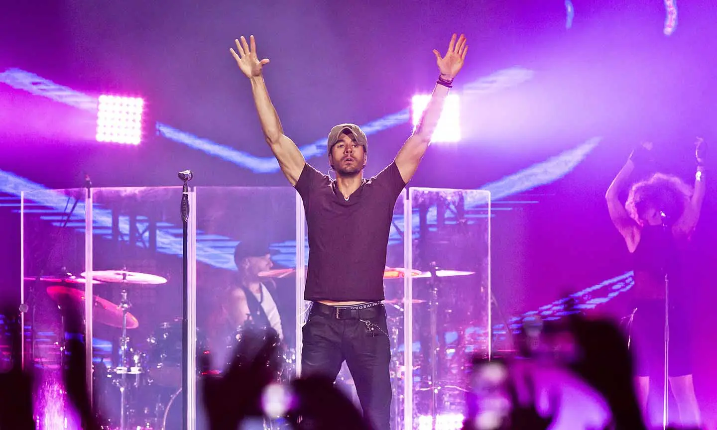 EXCLUSIVE!! Pop music superstar Enrique Iglesias takes to the waves and the  skies with a