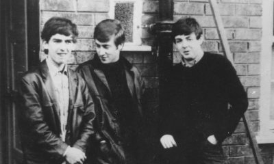 An early photo of George Harrison, John Lennon, and Paul McCartney