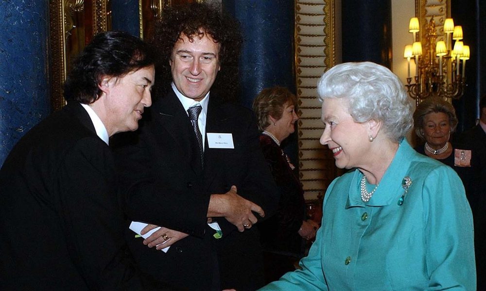 Queen Elizabeth II meeting music greats Brian May and Jimmy Page