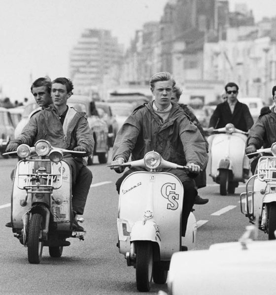 Mods in the UK riding Vespas