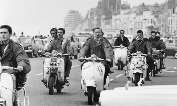 Mods in the UK riding Vespas