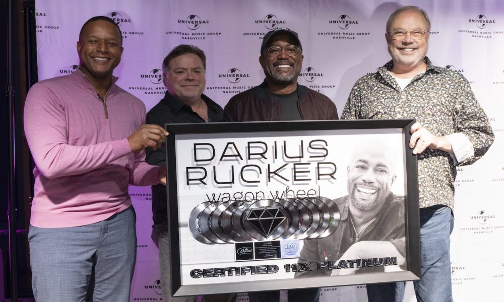 Darius Rucker is presented with the RIAA Diamond certification honor for 'Wagon Wheel.' L to R: 'Today' Anchor Craig Melvin; song producer Frank Rogers; Rucker; UMG Nashville Chairman/CEO Mike Dungan. Photo: Steve Lowry