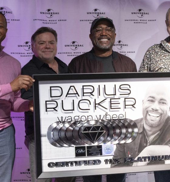 Darius Rucker is presented with the RIAA Diamond certification honor for 'Wagon Wheel.' L to R: 'Today' Anchor Craig Melvin; song producer Frank Rogers; Rucker; UMG Nashville Chairman/CEO Mike Dungan. Photo: Steve Lowry