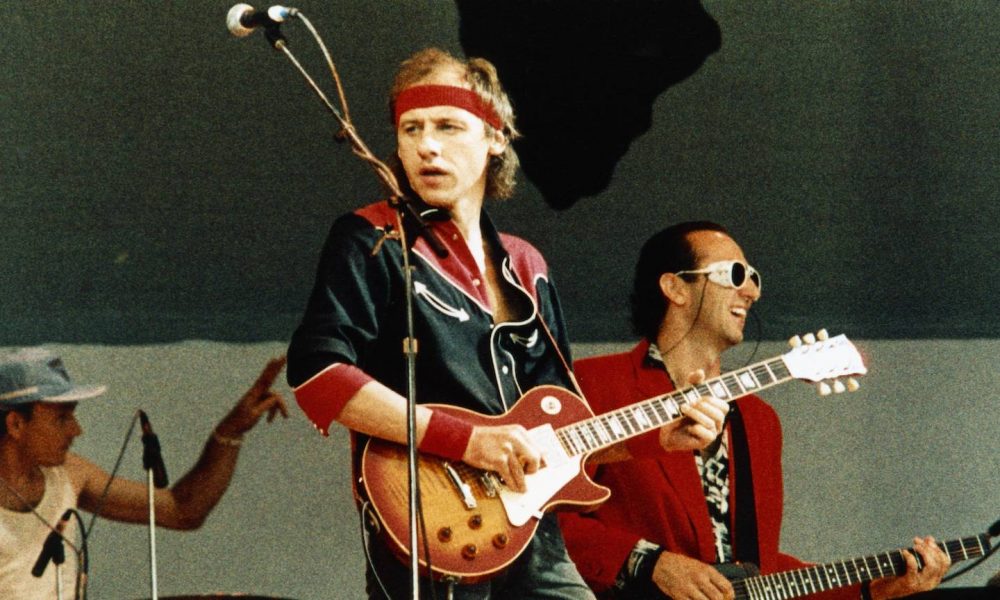 Jack Sonni (right) at Live Aid in 1985, alongside Mark Knopfler. Photo: Pete Still/Redferns