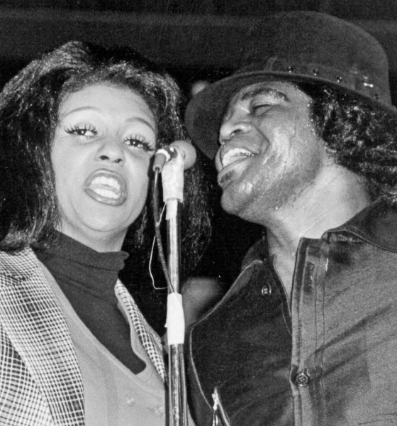 Lyn Collins and James Brown on stage circa 1972. Photo: Michael Ochs Archives/Getty Images