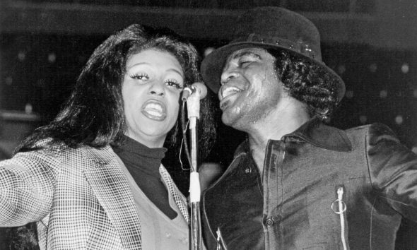 Lyn Collins and James Brown on stage circa 1972. Photo: Michael Ochs Archives/Getty Images
